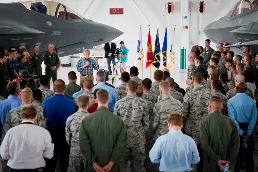 Defense Secretary Chuck Hagel addresses 33rd Fighter Wing service members during a troop call July 10 at Eglin Air Force Base, Fla.  Hagel visited the base to tour the wing and the F-35 Lightning II integrated training center.  During his tour, he held a 45-minute troop call to praise the work of the service members who began and continue to improve the DOD’s newest fighter program.  (U.S. Air Force photo/Samuel King Jr.)