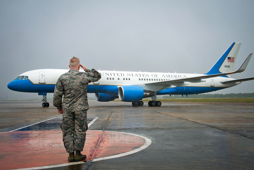 Maj. Gen. Scott Jansson, the Armament Directorate program executive officer, salutes as the Secretary of Defense arrives to Eglin Air Force Base, Fla., July 9.  Defense Secretary Chuck Hagel visited the base to tour the 33rd Fighter Wing and F-35 Lightning II integrated training center.  He held a 45-minute troop call to praise the work of the service members who began and continue to improve the DOD’s newest fighter program.  (U.S. Air Force photo/Chrissy Cuttita)