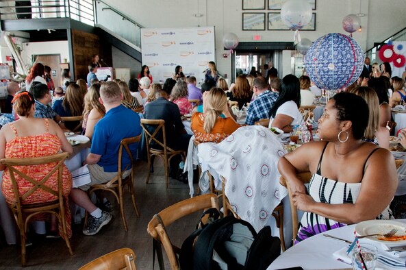 Mothers from Joint Base McGuire-Dix-Lakehurst ask Kim, Kourtney and Khloe Kardashian about children's fashion and their experience as mothers during an Operation Shower event in Jersey City, New Jersey. Operation Shower is a non-profit organization providing baby showers for military families to ease the stress of having a new baby. (U.S. Air Force photo/Airman 1st Class Tara A. Williamson)