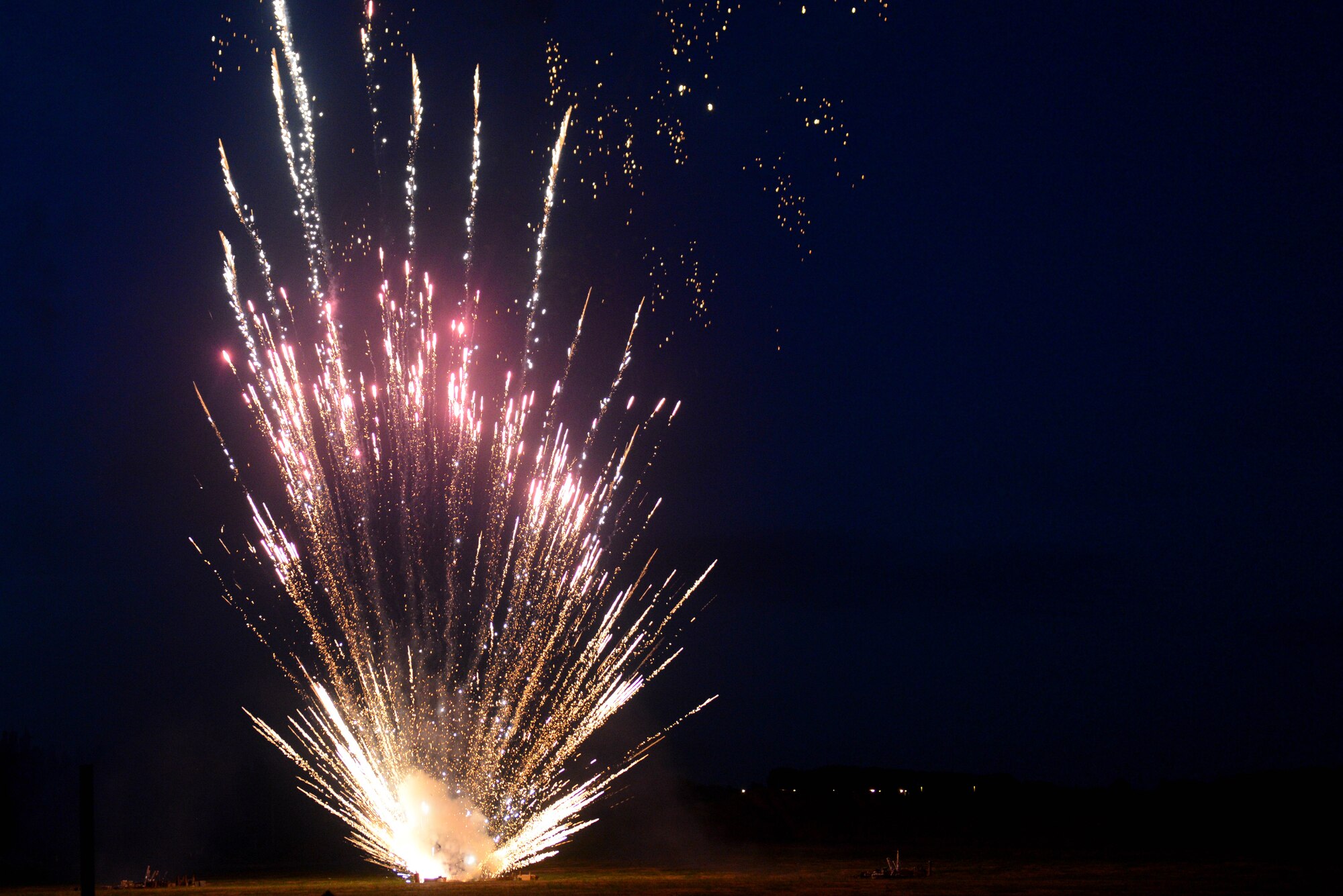 A firework lights the sky over RAF Croughton, United Kingdom, July 3, 2014. The fireworks show was part of the Independence Day celebration hosted by the 422nd Air Base Group. (U.S. Air Force photo by Tech. Sgt. Chrissy Best/Released)