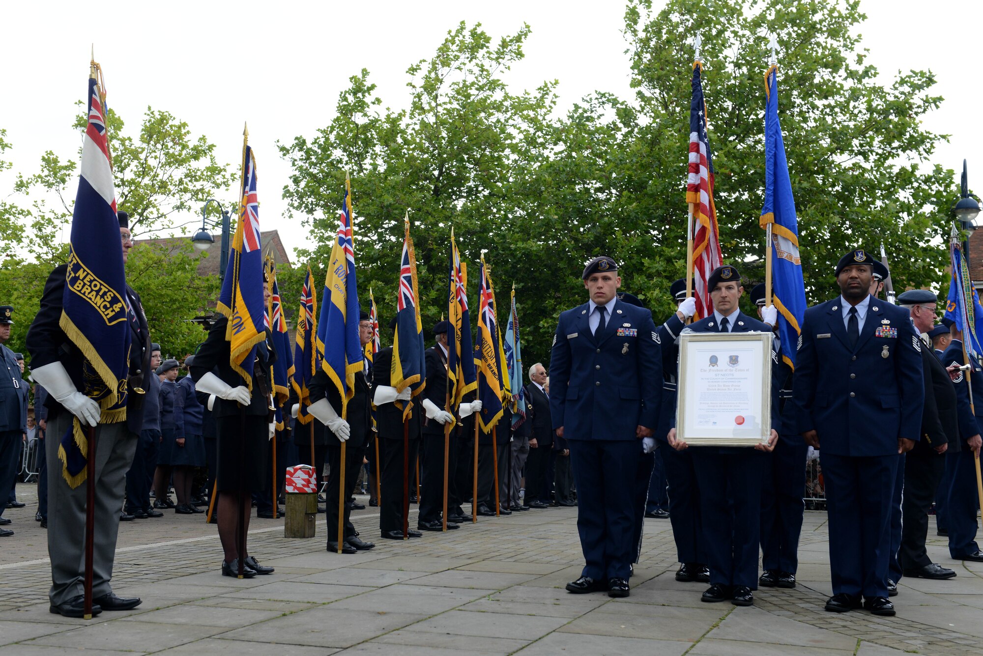 Airmen from the 423rd Air Base Group prepare to march through the streets of St. Neots, United Kingdom, during the Freedom of the Town and Armed Forces Day celebration, July 5, 2014. The festival marked the first time St. Neots presented the freedom of the town scroll to an entire U.S. military unit. (U.S. Air Force photo by Tech. Sgt. Chrissy Best/Released)