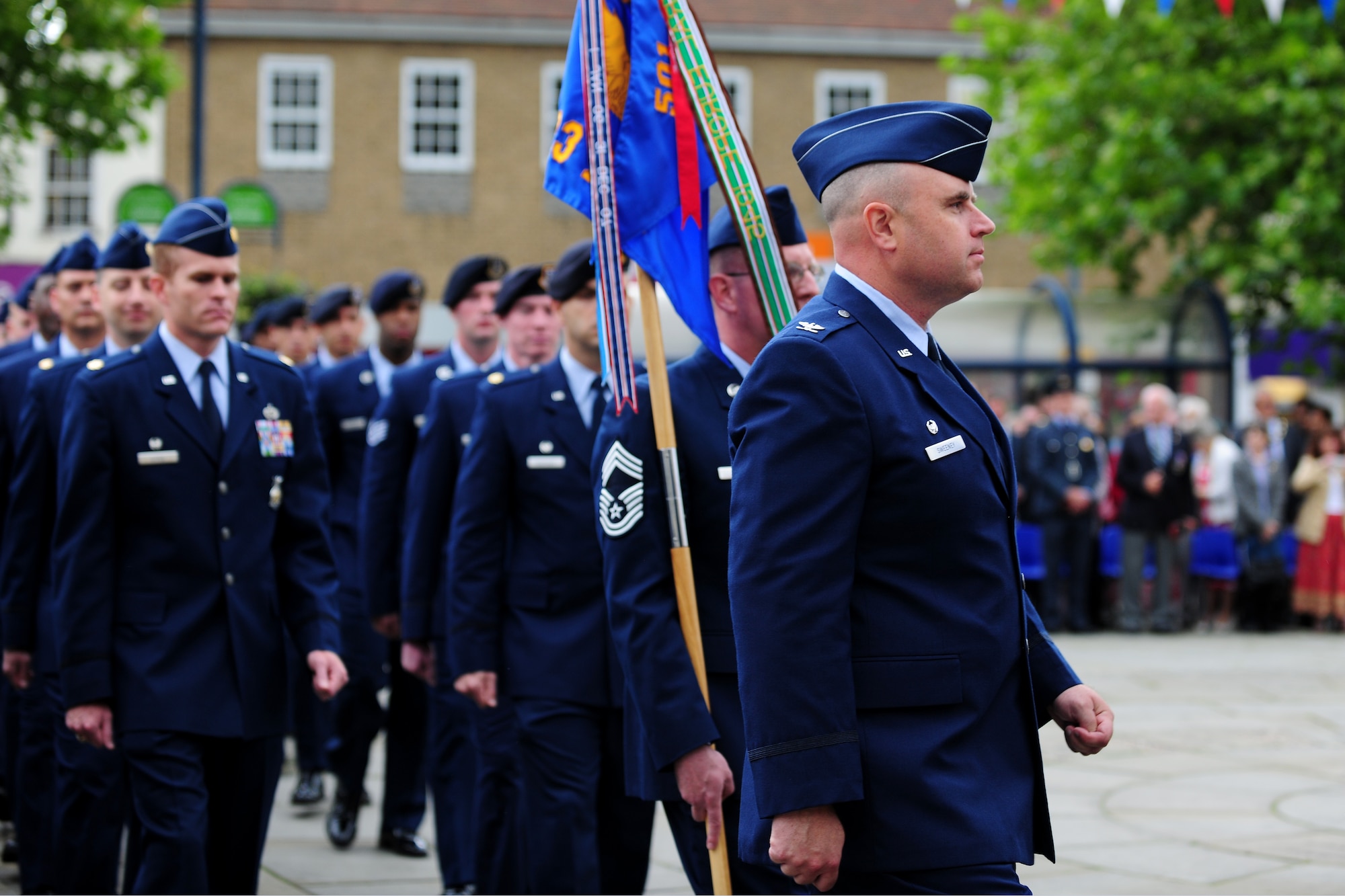 U.S. Air Force Col. Steven Sweeney, 423rd Air Base Group commander, leads a flight of Airmen during the Freedom of the Town and Armed Forces Day at St. Neots, United Kingdom, July 5, 2014. The festival marked the first time the city presented the freedom of the town scroll to American Armed Forces. (U.S. Air Force photo by Staff Sgt. Jarad A. Denton/Released)