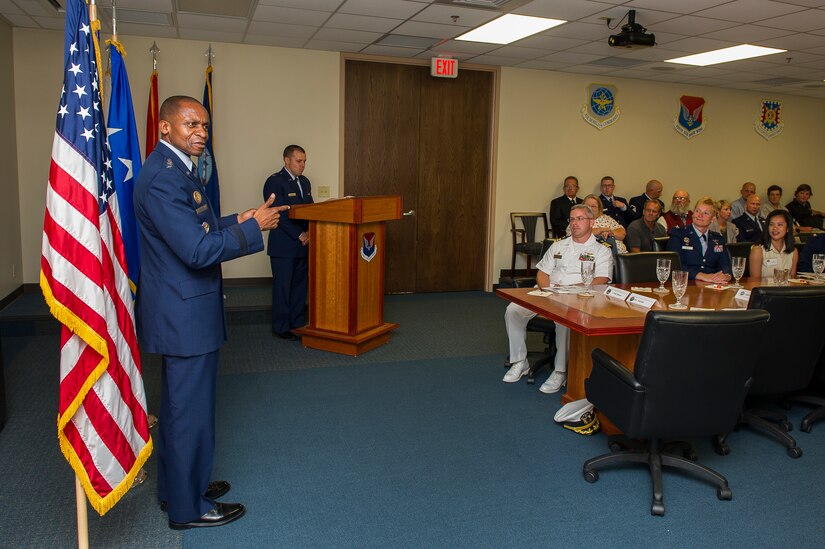 General Darren McDew, Air Mobility Command commander, speaks to attendees of the Joint Base Charleston mission brief, July 9, 2014, at Joint Base Charleston, S.C. McDew visited JB Charleston to get a firsthand look at how joint basing builds closer relationships and forges stronger ties between our sister services. (U.S. Air Force photo/Senior Airman George Goslin)