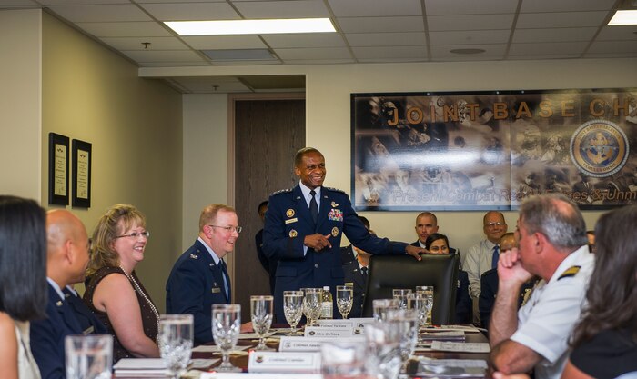 General Darren McDew, Air Mobility Command commander, speaks to attendees of the Joint Base Charleston mission brief, July 9, 2014, at Joint Base Charleston, S.C. McDew visited JB Charleston to get a firsthand look at how joint basing builds closer relationships and forges stronger ties between our sister services. (U.S. Air Force photo/Senior Airman George Goslin)