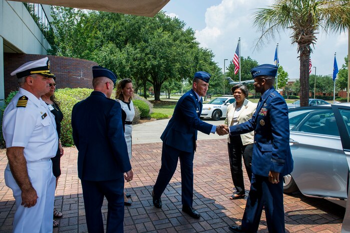 Col. John Lamontagne, 437th Airlift Wing commander, greets Gen. Darren McDew, Air Mobility Command commander, July 9, 2014, at Joint Base Charleston, S.C. McDew visited JB Charleston to get a firsthand look at how joint basing builds closer relationships and forges stronger ties between our sister services. (U.S. Air Force photo/Senior Airman George Goslin)