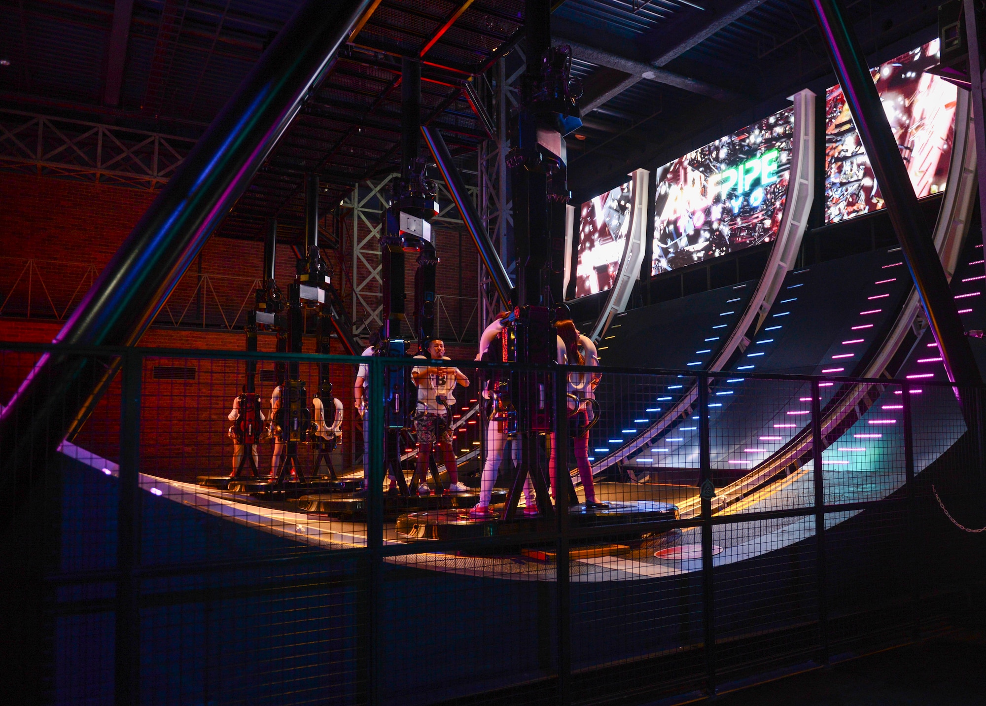 Halfpipe Tokyo is just one of the many interactive rides at Joypolis in Odaiba. The ride allows you to control how many times you spin at the top of the ride by stepping on a board each time you swing by the middle. (U.S. Air Force photo by Airman 1st Class Meagan Schutter/Released)