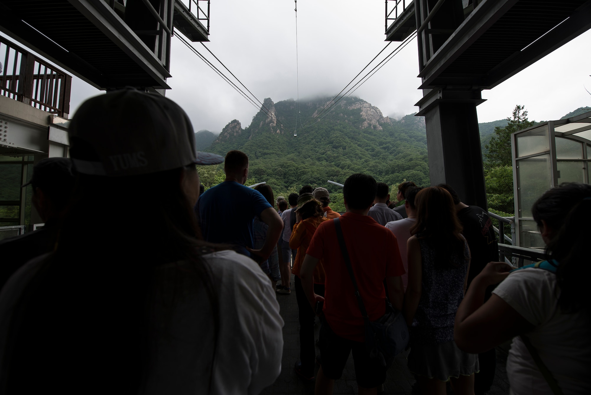 People wait for the cable car lift in Seoraksan Nationa Park July 5, 2014, in Sokcho, Republic of Korea. The cable car costs W9,000 per person and runs directly to one of the mountain range's peaks. (U.S. Air Force photo by Staff Sgt. Jake Barreiro)
