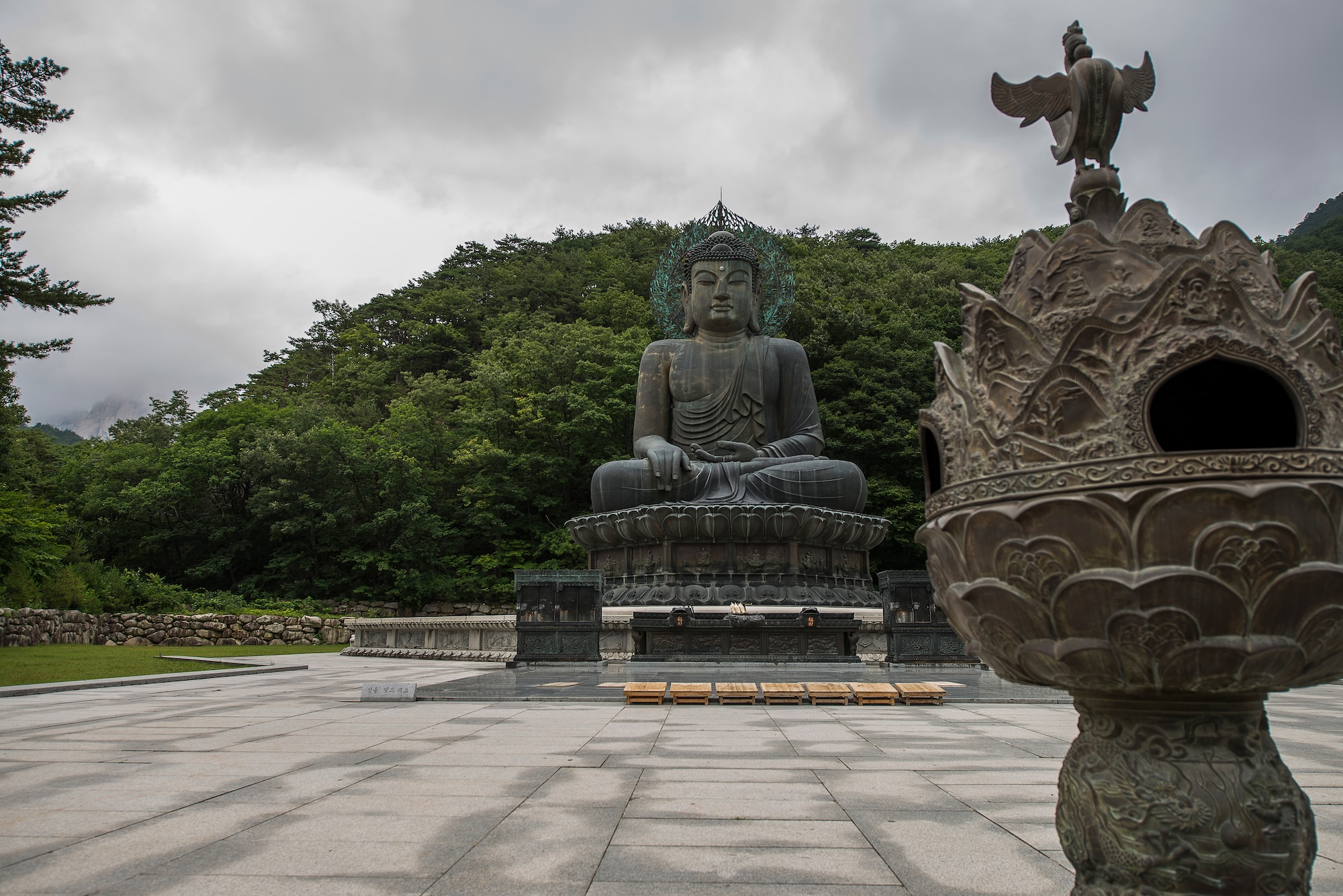 The Great Unification Buddha belongs to the Sinhuengsa Temple in Seoraksan National Park, pictured here July 5, 2014, in Sokcho, Republic of Korea. The statue and its pedestal are made of bronze and worth more than $4 million. (U.S. Air Force photo by Staff Sgt. Jake Barreiro)