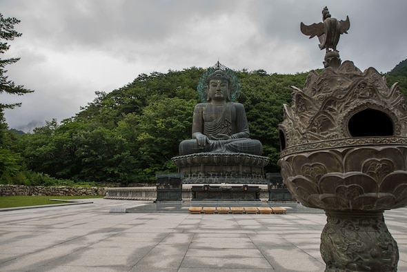 The Great Unification Buddha belongs to the Sinhuengsa Temple in Seoraksan National Park, pictured here July 5, 2014, in Sokcho, Republic of Korea. The statue and its pedestal are made of bronze and worth more than $4 million. (U.S. Air Force photo by Staff Sgt. Jake Barreiro)