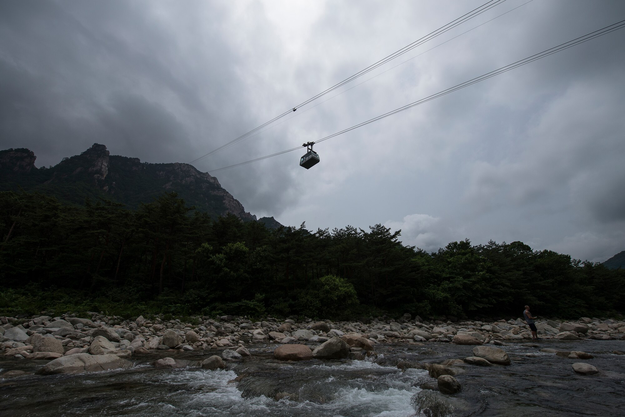 A cable car ascends to one of the mountain peaks in Seoraksan National Park July 5, 2014, in Sokcho, Republic of Korea. The cable car allows travelers to circumvent hiking one of the park's numerous trails, some of which are as long as 16 kilometers. (U.S. Air Force photo by Staff Sgt. Jake Barreiro)