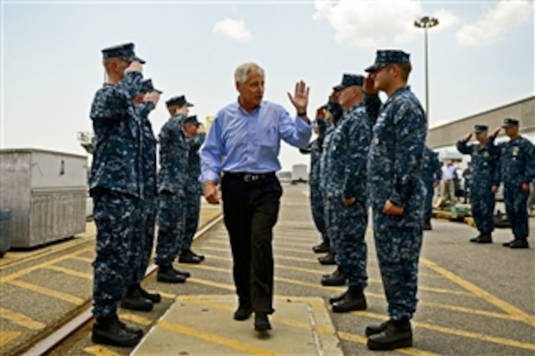Defense Secretary Chuck Hagel greets sailors as he arrives on Naval Submarine Base Kings Bay, Ga., July 9, 2014. While on the submarine base, Hagel also toured the ballistic missile submarine USS Tennessee and a Trident submarine refit facility. 