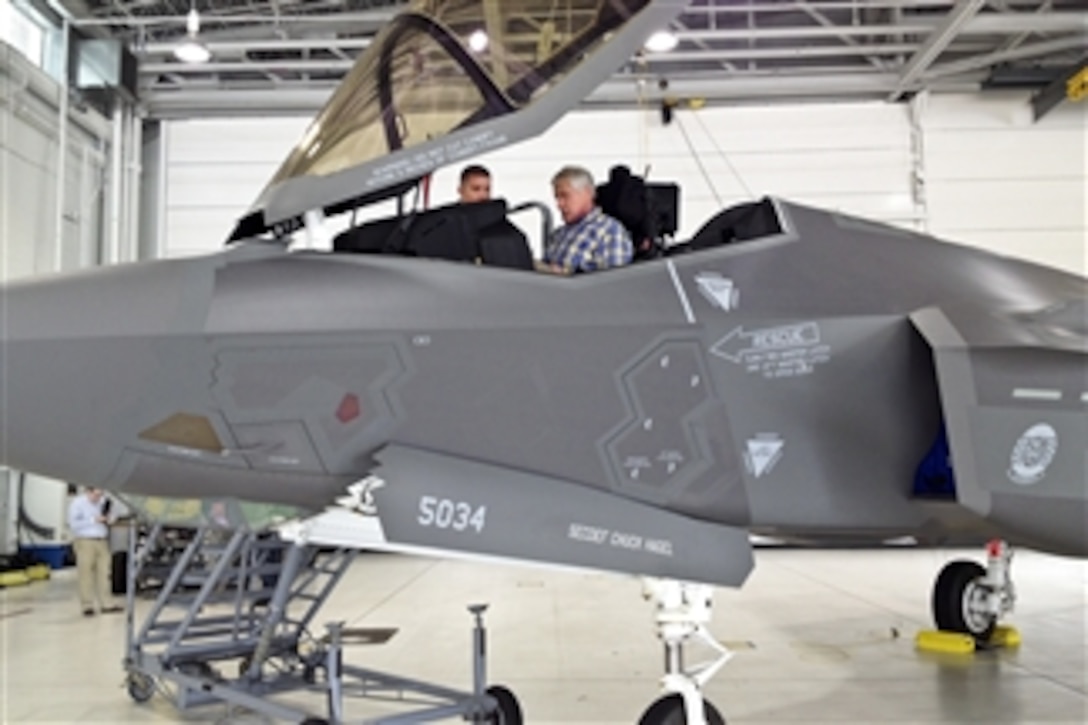Defense Secretary Chuck Hagel sits in an F-35A Lightning II joint strike fighter aircraft on Eglin Air Force Base, Fla., July 10, 2014, during a two-day trip to visit bases in the South. Eglin is home to the Air Force’s first full squadron of  F-35A Lightning II aircraft.