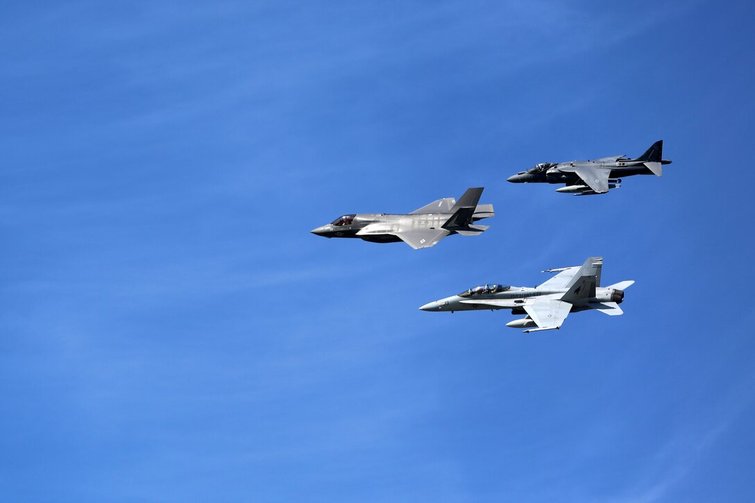 An F-35B Lightning II, F/A-18 Hornet and an AV-8B Harrier fly in formation May 17 during the 2014 Marine Corps Air Station Cherry Point Air Show. 