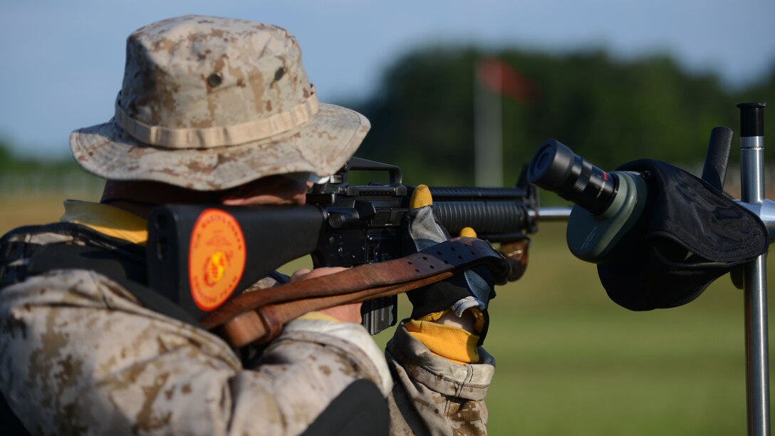Sgt. Joseph Peterson, a member of the Marine Corps Shooting Team, prepares to fire a round during the 53rd Annual Interservice Rifle Championship on July 7, 2014, at Range 4, Weapons Training Bn., Marine Corps Base Quantico. Peterson was one of several Marines who competed in the individual events and will also shoot in the team events. 