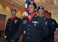 A color guard from the 864th Engineer Battalion at Fort Lewis, Wash., provides the traditional posting of the colors, an essential element of military change-of-command ceremonies.