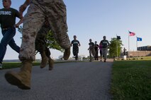 Officer candidates and applicants begin the Combat Fitness Test with an 880-yard sprint at Veterans Park in Milwaukee, Wis., July 10, 2014.  Officer Selection Station Milwaukee conducted a Combat Fitness Test to help prepare their officer candidates and applicants for Officer Candidates School.
