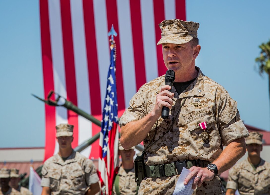 Lieutenant Col. John R. O’Neal reflects on his time as the commanding officer of the 15th Marine Expeditionary Unit during a change of command ceremony aboard Camp Pendleton, Calif., July 10, 2014. (U.S. Marine Corps photo by Cpl. Emmanuel Ramos/Released)