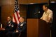 Karl Beilby, a contractor with the Fort Campbell, Ky.-based 101st Airborne Division,  speaks during an award ceremony for Master Sgt. Roger Sparks, a pararescueman from the 212th RQS on Joint Base Elmendorf-Richardson, July 11. Sparks was awarded the Silver Star, the nation’s third-highest award for valor, for his role in a firefight with insurgents during Operation Bulldog Bite in Afghanistan’s Watapur Valley on Nov. 14, 2010. Beilby was one of four men that Sparks was credited with saving during the events of that day. (U.S. Army National Guard photo by Sgt. Edward Eagerton/released)