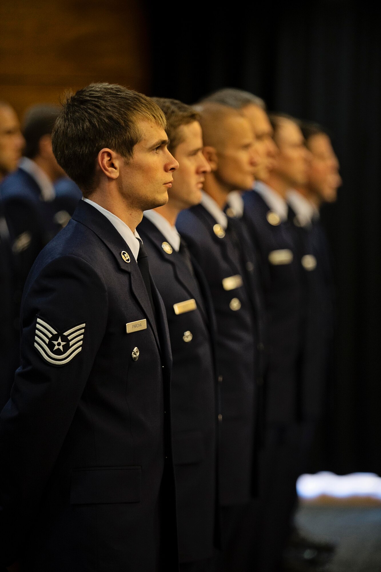 Pararescuemen with the Alaska Air National Guard's 212th Rescue Squadron stand in formation during a Silver Star Medal award ceremony on Joint Base Elmendorf-Richardson, July 11. A fellow 212th pararescueman, Master Sgt. Roger Sparks, was awarded the Silver Star, the nation’s third-highest award for valor, for his role in a firefight with insurgents during Operation Bulldog Bite in Afghanistan’s Watapur Valley on Nov. 14, 2010. His actions during the combat operation resulted in four American lives being saved and four casualties being returned to their families with honor and dignity. (U.S. Army National Guard photo by Sgt. Edward Eagerton/released)