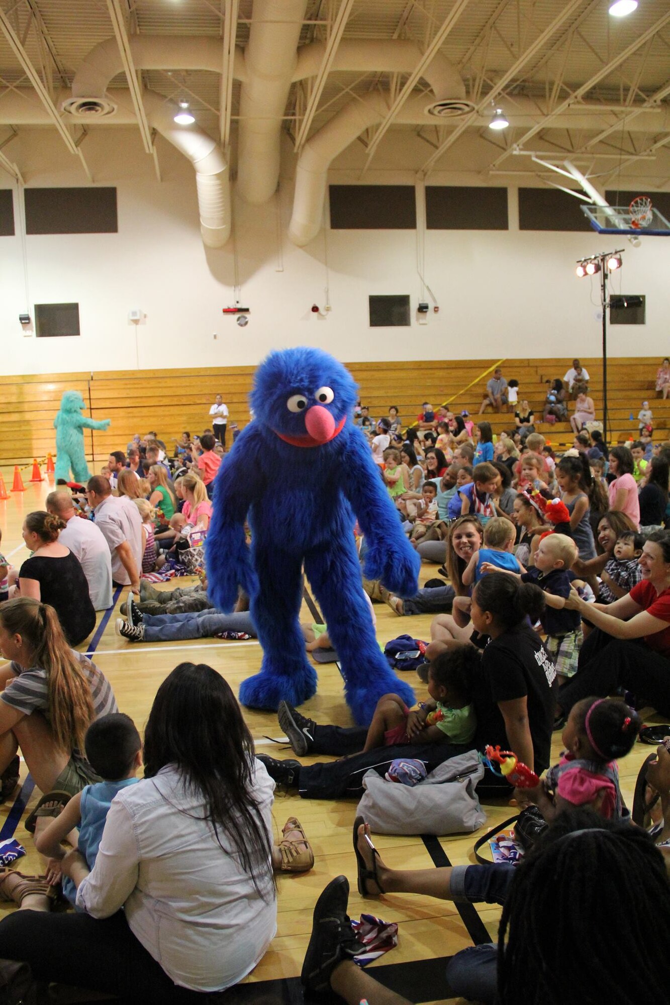 Grover is one of a number of Sesame Street characters who visited with children at Mountain Home Air Force Base, Idaho, July 8 and 9, 2014. Sesame Street and the United Service Organization offered three performances during their two-day visit to Idaho. (Courtesy Photo)