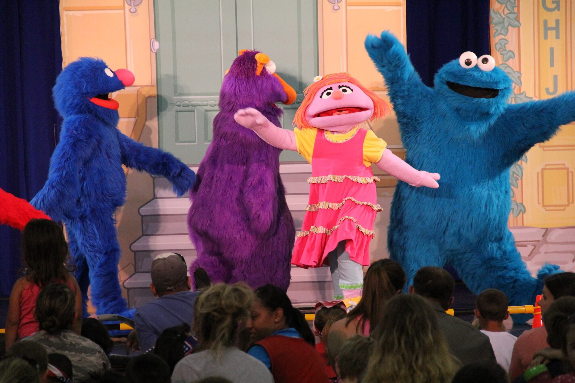 Sesame Street and the United Service Organization visit Mountain Home Air Force Base, Idaho, July 8 and 9, 2014, to help with issues military families frequently face. During the two-day stop, the characters provided three performances at the Base Fitness Center gym.  (Courtesy Photo)