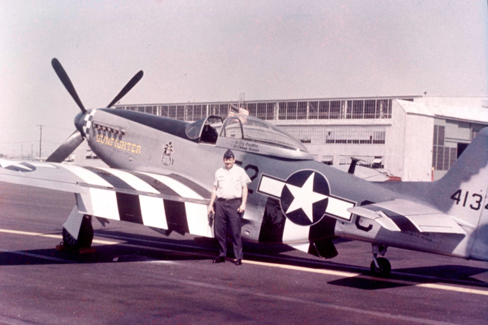 OFFUTT AIR FORCE BASE, Neb. -- Now retired U.S. Air Force Brig. Gen. Regis F.A. Urschler, former 55th Strategic Reconnaissance Wing commander, stands in front of his newly acquired P-51 Mustang in 1978. Urschler had the Mustang repainted in the 343d Fighter Squadron colors, which has evolved into the 343d Reconnaissance Squadron located here. (Courtesy Photo)