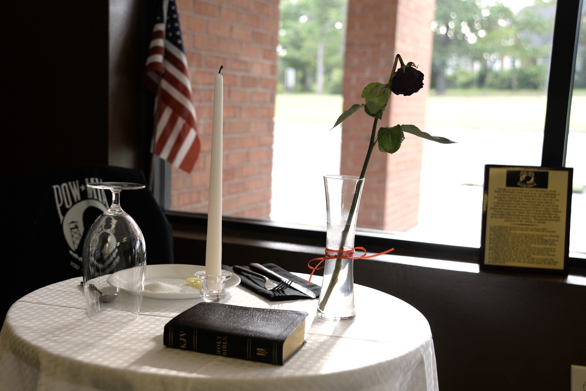 Dark Cup O’ Joe proudly displays a POW/MIA table inside their coffee shop, Sumter, S.C., July 3, 2014. The coffee shop opened in 2013 and is owned by three military contractors currently supporting the mission overseas. (U.S. Air Force photo by Airman 1st Class Diana M. Cossaboom/Released)