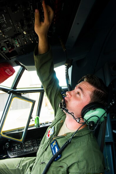 U.S. Air Force Senior Airman Todd Johnson,  71st Rescue Squadron HC-130J Combat King II loadmaster, performs a preflight inspection at Moody Air Force Base, Ga., July 11, 2014. As a loadmaster, Johnson is responsible for ensuring the aircraft is prepared for a safe take off.  (U.S. Air Force photo by Airman 1st Class Ceaira Tinsley/Released)