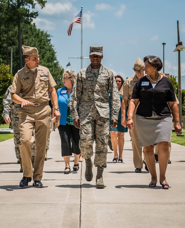 Gen. Darren McDew, Air Mobility Commander commander, and his wife Evelyn, tour the Naval Nuclear Power Training Command with Navy Capt. John Fahs, NNPTC commanding officer July 10, 2014, at Joint Base Charleston, S.C. McDew interacted with service members, families, Department of Defense civilian employees, contractors and local civic leaders in a variety of venues at JB Charleston during his three-day visit.  McDew assumed command of AMC May 5, 2014, becoming the 11th AMC commander and is responsible for more than 130,000 active duty, Air National Guard, Air Force Reserve and DOD civilian employees comprising AMC. (U.S. Air Force photo/Senior Airman Dennis Sloan)