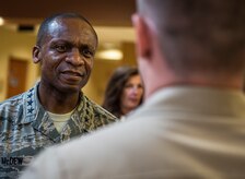 Gen. Darren McDew, Air Mobility Commander commander, greets a Sailor during his visit to the Naval Nuclear Power Training Command, July 10, 2014, at Joint Base Charleston, South Carolina. The AMC commander interacted with service members, families, Department of Defense civilian employees, contractors and local civic leaders in a variety of venues at JB Charleston during his three-day visit. (U.S. Air Force photo/Senior Airman Dennis Sloan) 

