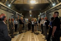 Members of the 502nd Air Base Wing Honorary Commanders Program tour the inside of a C-17 Globemaster that is being converted to train medical personnel for in-flight patient care July 2, 2014 at Joint Base San Antonio-Randolph. The Honorary Commander Program matches local civic leaders with Air Force commanders and is aimed at increasing public awareness and understanding of the armed forces and their missions. (U.S. Air Force photo by A1C Stormy D. Archer/Released)