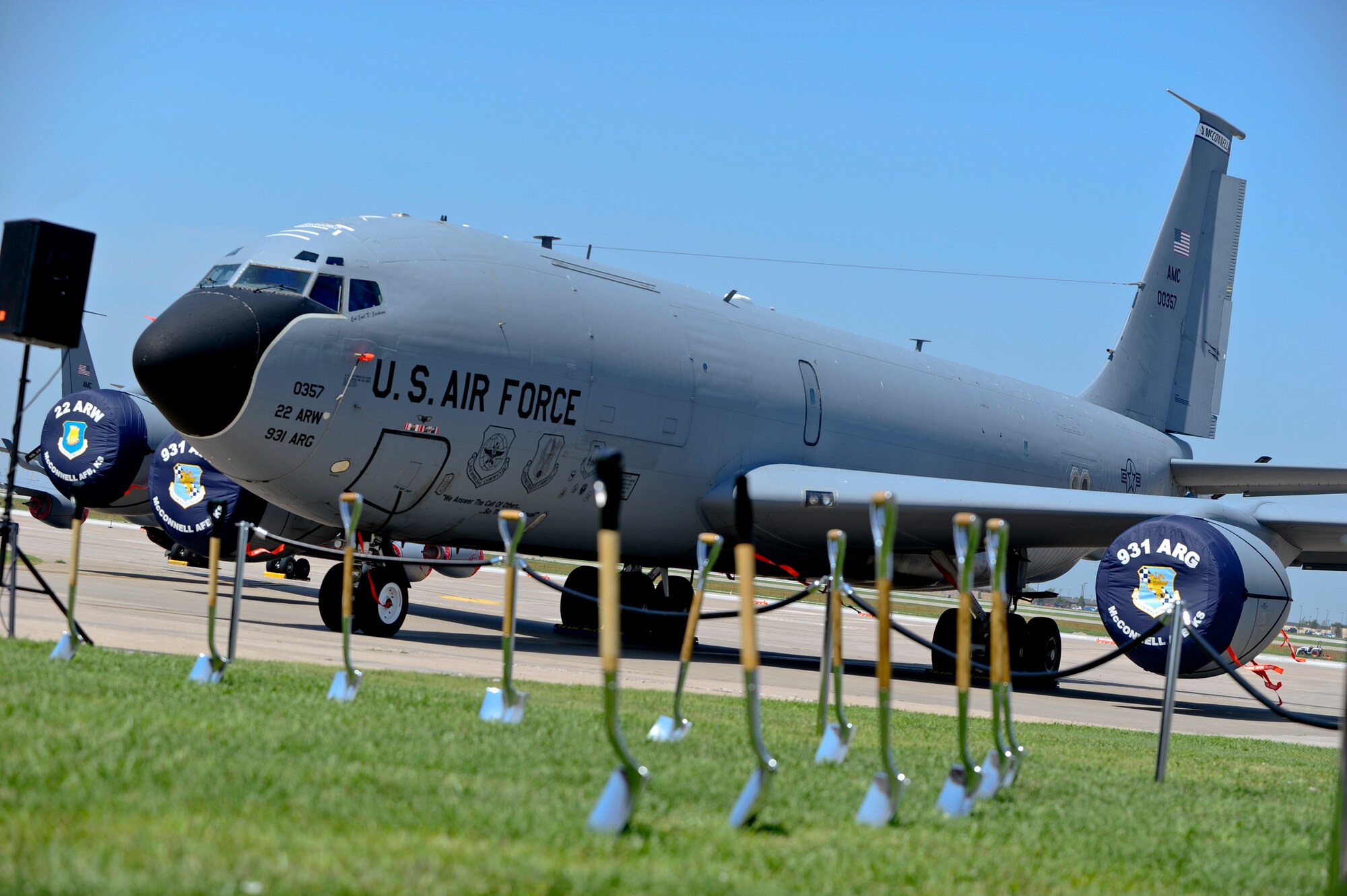 A KC-135R Stratotanker rests behind the ceremonial ground of the KC-46A Pegasus groundbreaking ceremony, June 30, 2014, at McConnell Air Force Base, Kan. The Pegasus is part of a three phase effort to recapitalize the Air Force's tanker fleet and is expected to arrive at McConnell in 2016. (U.S Air Force photo/Airman 1st Class John Linzmeier) 