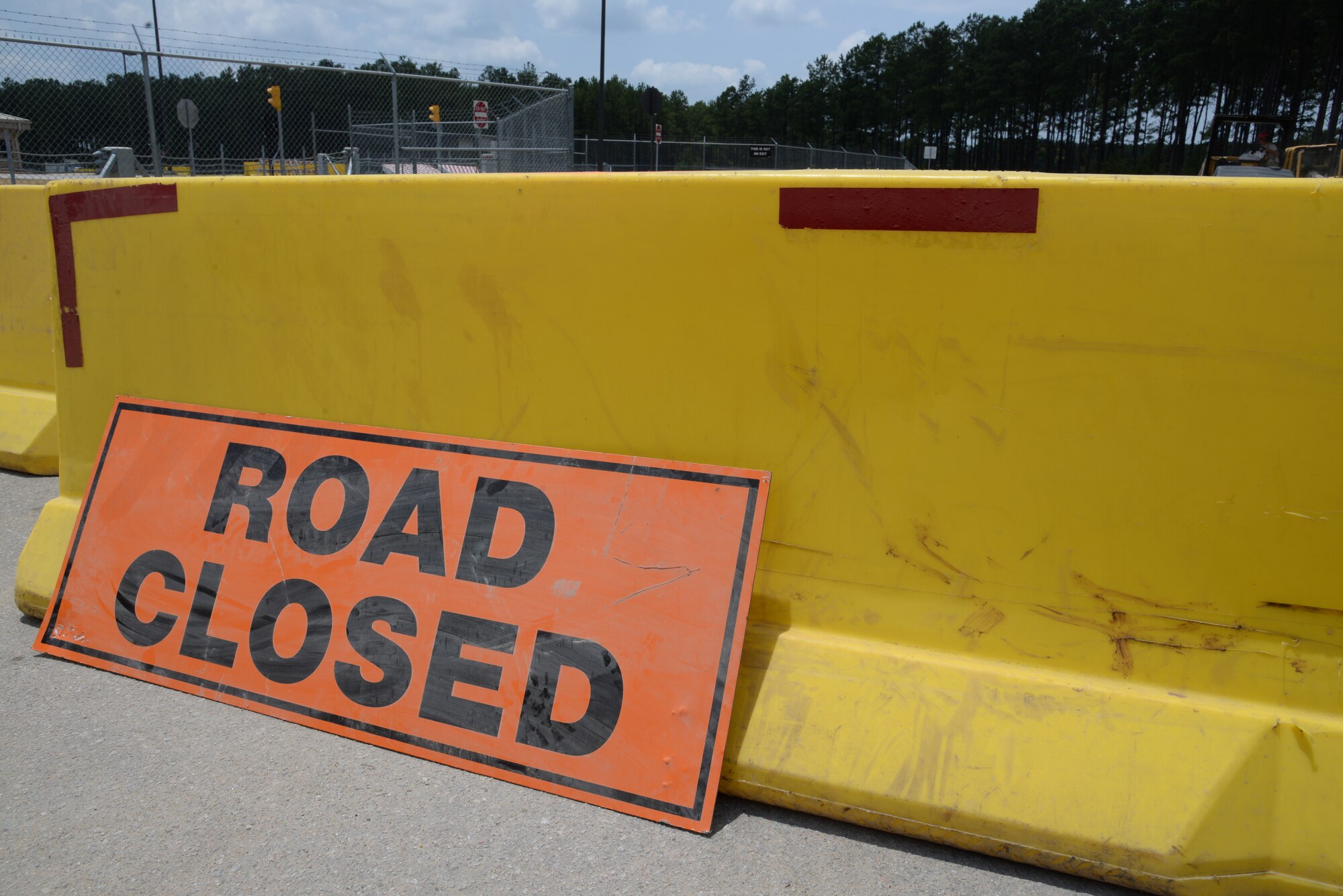 A road closed sign makes a section of Patrol Road under construction at Shaw Air Force Base, S.C., July 10, 2014. The Airmen responsible for the construction are the 823rd Rapid Engineer Deployable Heavy Operational Repair Squadron Engineers. (U.S. Air Force photo by Airman 1st Class Jonathan Bass/Released)