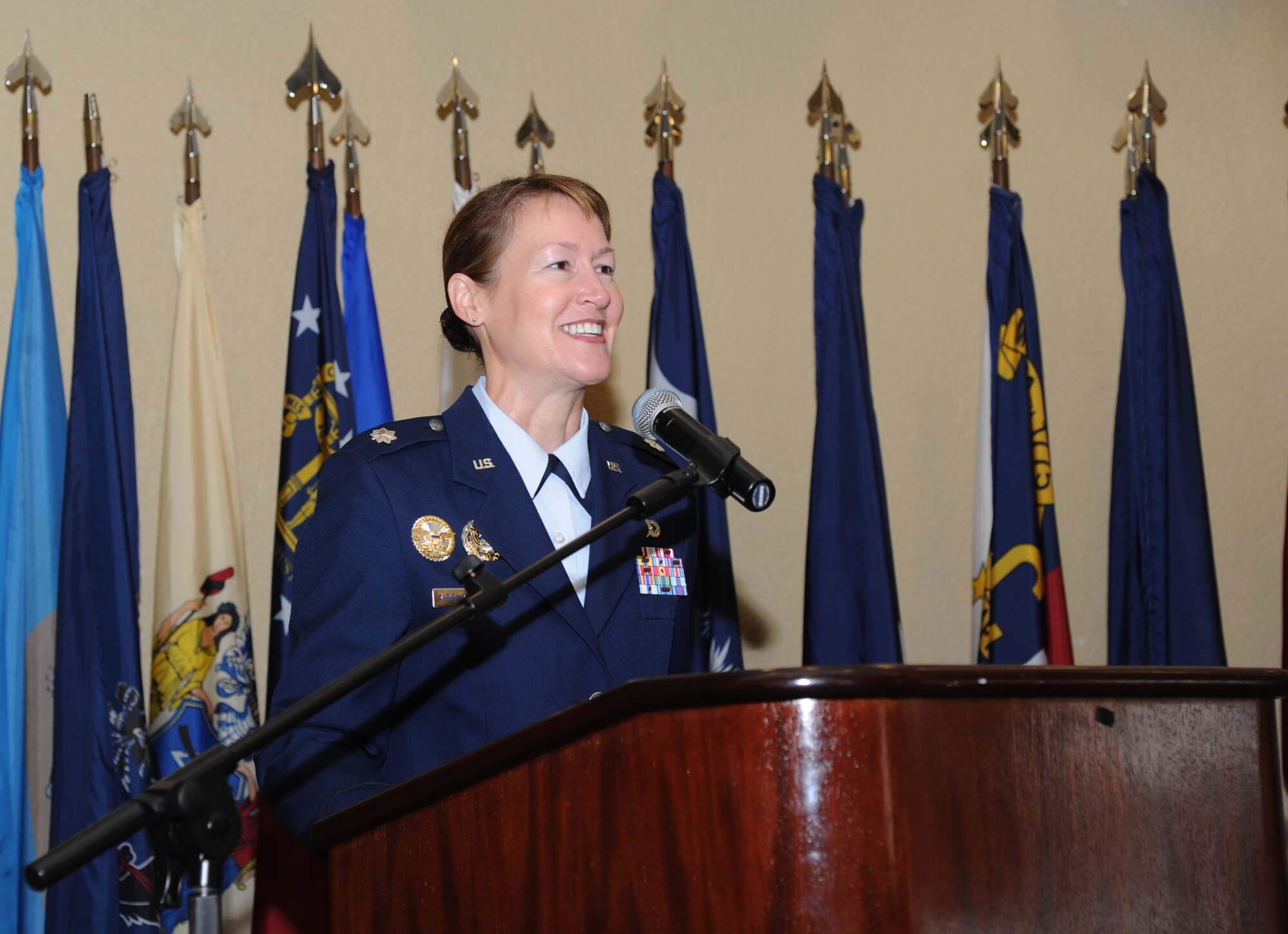 Lt. Col. Susan Airola-Skully, 81st Mission Support Group incoming commander, delivers remarks after she assumes command during the 81st MSG change of command ceremony July 10, 2014, at the Bay Breeze Event Center, Keesler Air Force Base, Miss. Airola-Skully was previously the deputy director, officer and enlisted personnel management, for the Under Secretary of Defense for Personnel and Readiness, Office of the Secretary of Defense, at the Pentagon.   She replaces Col. Mark Vivians who will retire July 11.  (U.S. Air Force photo by Kemberly Groue)
