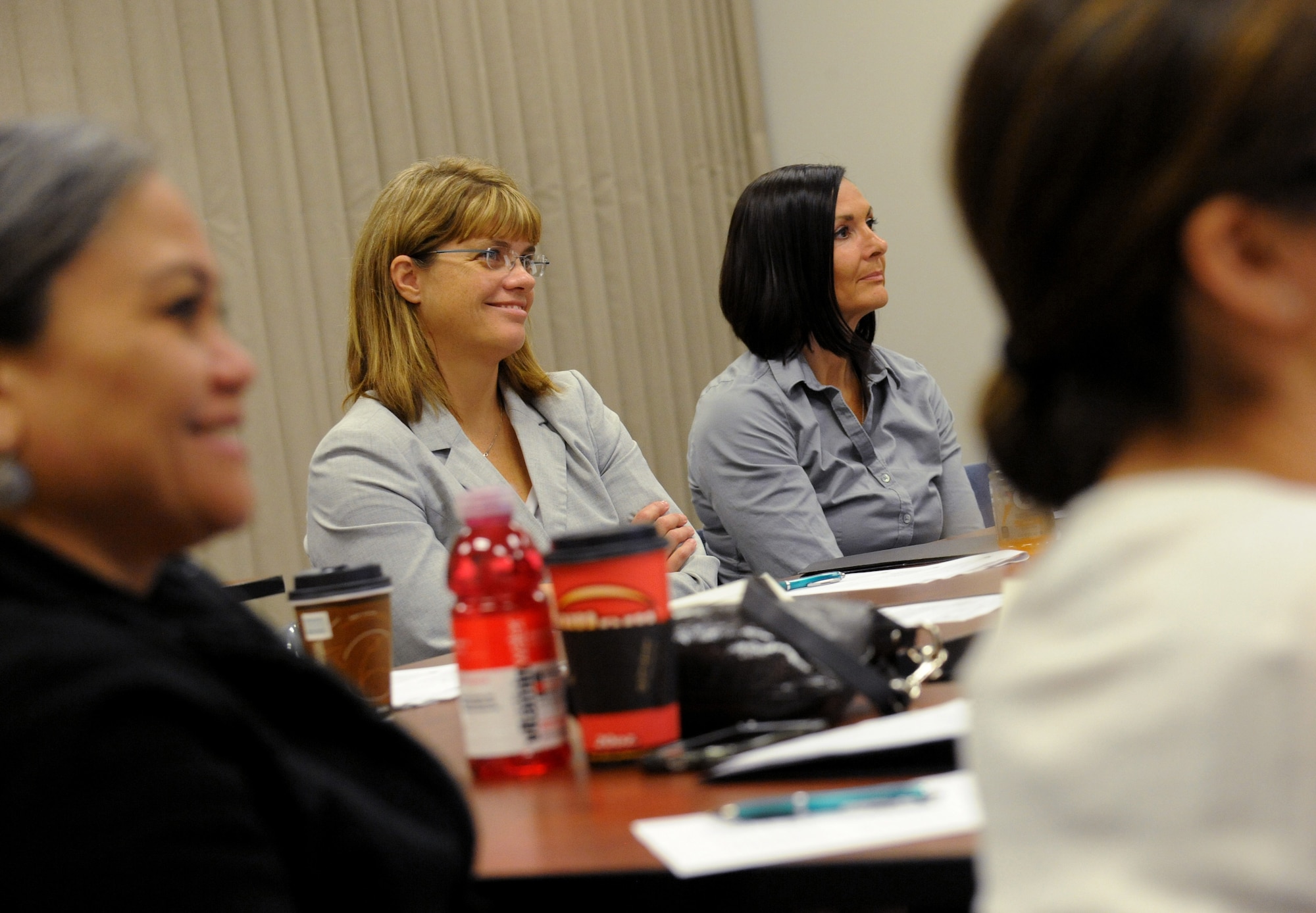 Army National Guard Sgt. 1st Class Cammy Price, center left, and Air National Guard Master Sgt. Michelle Lowe, center right, as well as other victim advocates from the Oregon National Guard, participate in three days of Sexual Assault Prevention and Response (SAPR) training at the Portland Air National Guard Base, Ore., June 24-26, 2014. The overall goal of the training helps victim advocates serve as facilitators and as a confidential source to aid a victim of sexual abuse. (U.S. Air National Guard photo by Tech. Sgt. John Hughel, 142nd Fighter Wing Public Affairs/Released) 