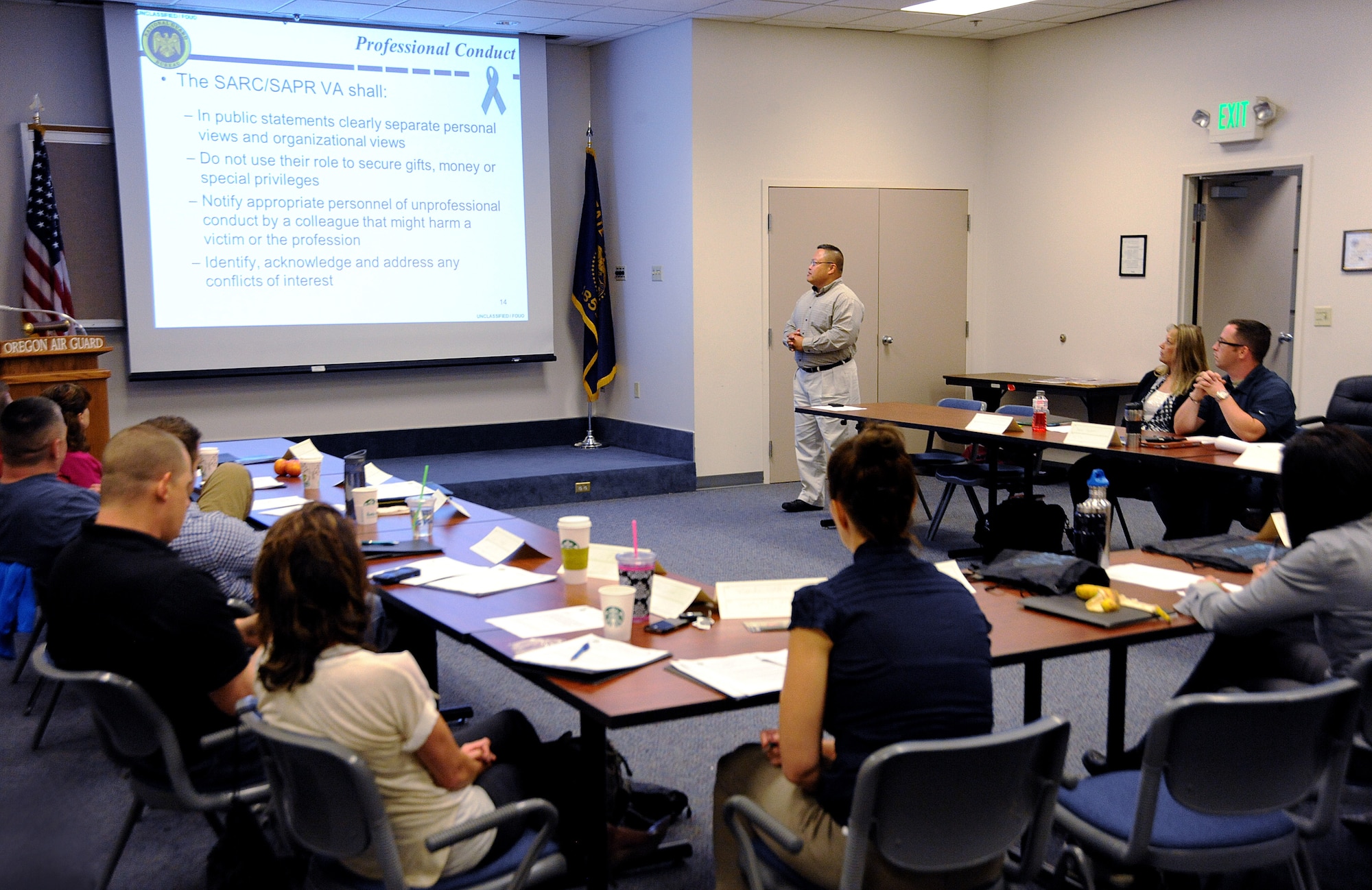 Oregon Army National Guard Maj. Rey Agullana, Sexual Assault Response Coordinator (SARC), for Joint Forces Headquarters, in Salem, Ore., leads a discussion to sexual assault victim advocates during three days of training at the Portland Air National Guard Base, Ore., June 24-26, 2014. (U.S. Air National Guard photo by Tech. Sgt. John Hughel, 142nd Fighter Wing Public Affairs/Released) 