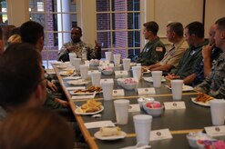 Gen. Darren McDew, Air Mobility Command commander, engages young officers at a breakfast during his visit to Joint Base Charleston July 11, 2014. McDew used this forum to field questions and seek input from JB Charleston’s junior servicemembers while sharing leadership lessons from his 32 years on active duty. The AMC commander interacted with service members, families, Department of Defense civilian employees, contractors and local civic leaders in a variety of venues at JB Charleston during his three-day visit. McDew also previously commanded the 14th Airlift Squadron at Charleston Air Force Base from 1997-1999.  (U.S. Air Force photo/1st Lt. Christopher Love)