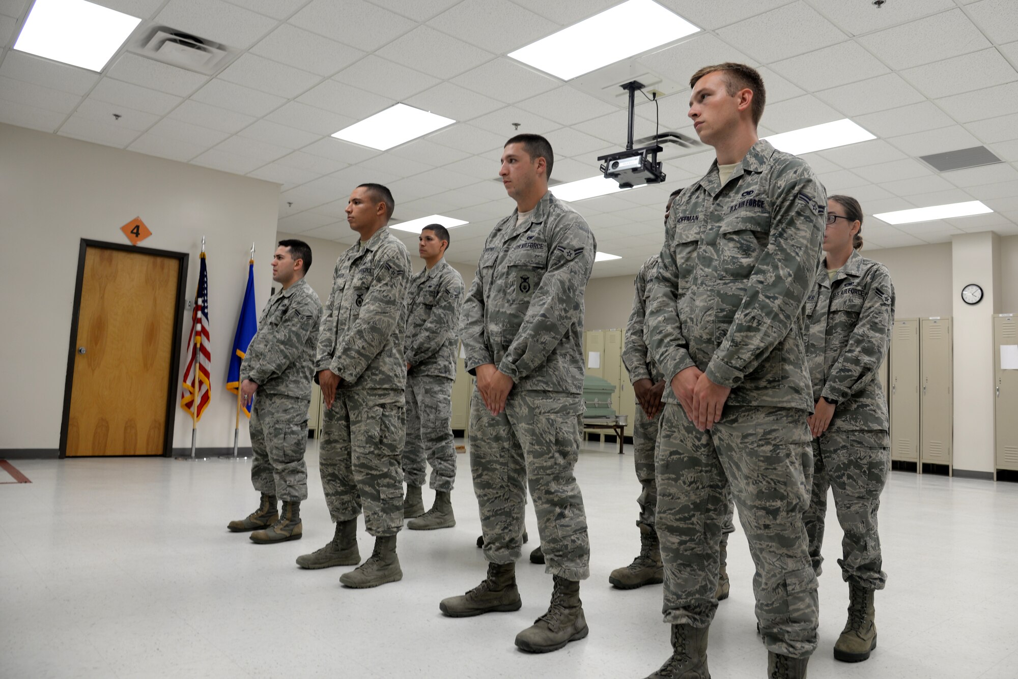 A base honor guard training class forms up to receive an end-of-day briefing July 9, 2014, at Moody Air Force Base, Ga. Ceremonial guardsmen here initially go through three weeks of full-time training to perfect their movements during their four- to six-month rotations. (U.S. Air Force photo by Airman 1st Class Sandra Marrero/Released)
