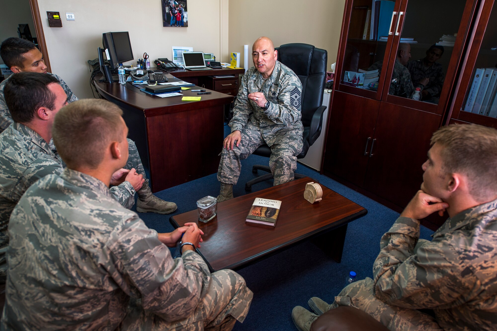 Cadets from the United States Air Force Academy meet with Command Chief Master Sgt. Jose Barraza for a mentoring session July 7, 2014. Cadets participate in the deployed operations program which allows them to shadow active duty Airmen working in the operational Air Force. 