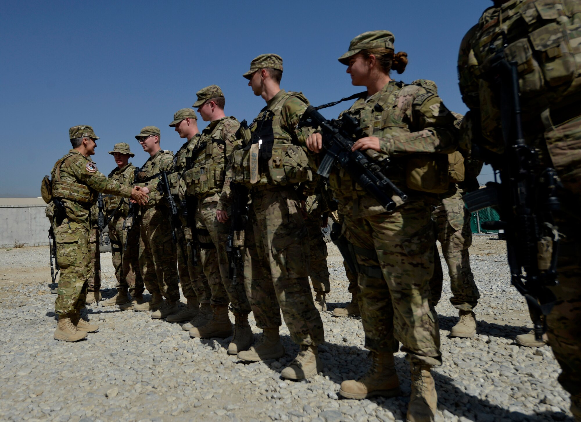 Chief Master Sgt. Ramon Colon-Lopez, Air Forces Central Command command chief, speaks to Airmen from the 455th Expeditionary Base Defense Squadron during his first visit as AFCENT command chief to Bagram Airfield, Afghanistan July 9, 2014.  Colon-Lopez toured Bagram and asked Airmen about their concerns and what needed improvement.  (U.S. Air Force photo by Staff Sgt. Evelyn Chavez/Released)