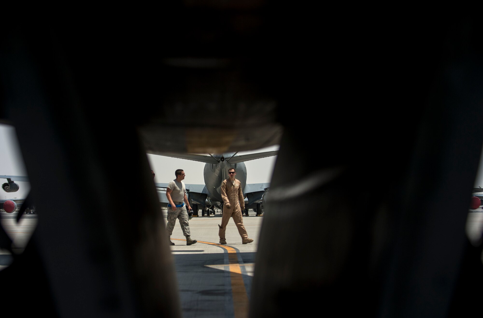 U.S. Air Force Capt. Gregory Jemo, 340th Expeditionary Air Refueling Squadron pilot, conducts a pre-flight inspection on the KC-135 Stratotanker before flying a mission in support of Operation Enduring Freedom out of Al Udeid Air Base, Qatar, July 10, 2014. The KC-135 provides the core aerial refueling capability for the United States Air Force and has excelled in this role for more than 50 years. (U.S. Air Force photo by Senior Airman Matthew Bruch)