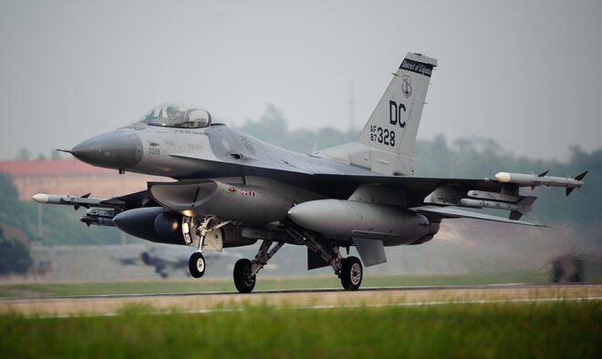 An F-16 Fighting Falcon from the District of Columbia Air National Guard takes off for a training sortie as part of the 2014 Theater Security Package at Kunsan Air Base, Republic of Korea, June 10, 2014. The District of Columbia Air National Guard and New Jersey Air National Guardsmen joined the Wolf Pack as part of the TSP that routinely deploys additional fighters, tankers, equipment and personnel to bolster U.S. forces across the Asia-Pacific region. (U.S. Air Force photo by Senior Airman Armando A. Schwier-Morales/Released)