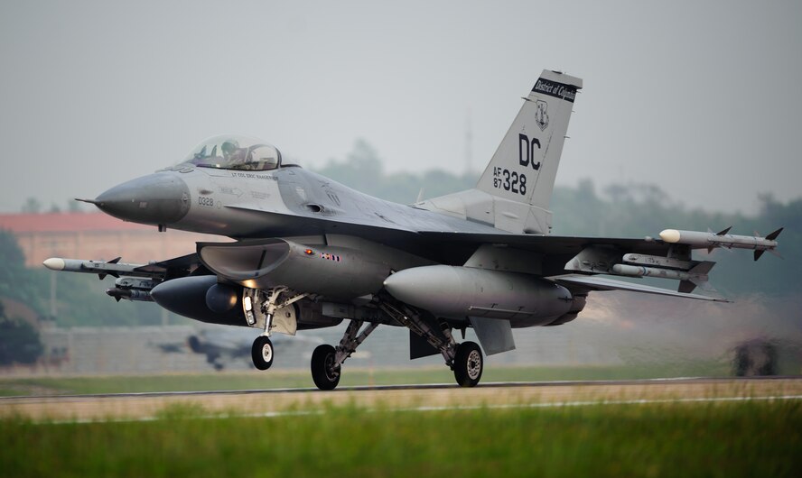 An F-16 Fighting Falcon from the District of Columbia Air National Guard takes off for a training sortie as part of the 2014 Theater Security Package at Kunsan Air Base, Republic of Korea, June 10, 2014. The District of Columbia Air National Guard and New Jersey Air National Guardsmen joined the Wolf Pack as part of the TSP that routinely deploys additional fighters, tankers, equipment and personnel to bolster U.S. forces across the Asia-Pacific region. (U.S. Air Force photo by Senior Airman Armando A. Schwier-Morales/Released)