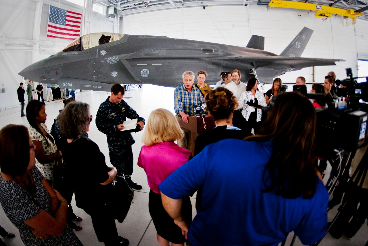 Defense Secretary Chuck Hagel speaks with reporters after touring the 33rd Fighter Wing and the F-35 Lightning II integrated training center at Eglin Air Force Base, Fla., July 10, 2014. During his visit, he met with Eglin service members for 45 minutes to praise their work in the Defense Department’s newest fighter program. U.S. Air Force photo by Samuel King Jr.