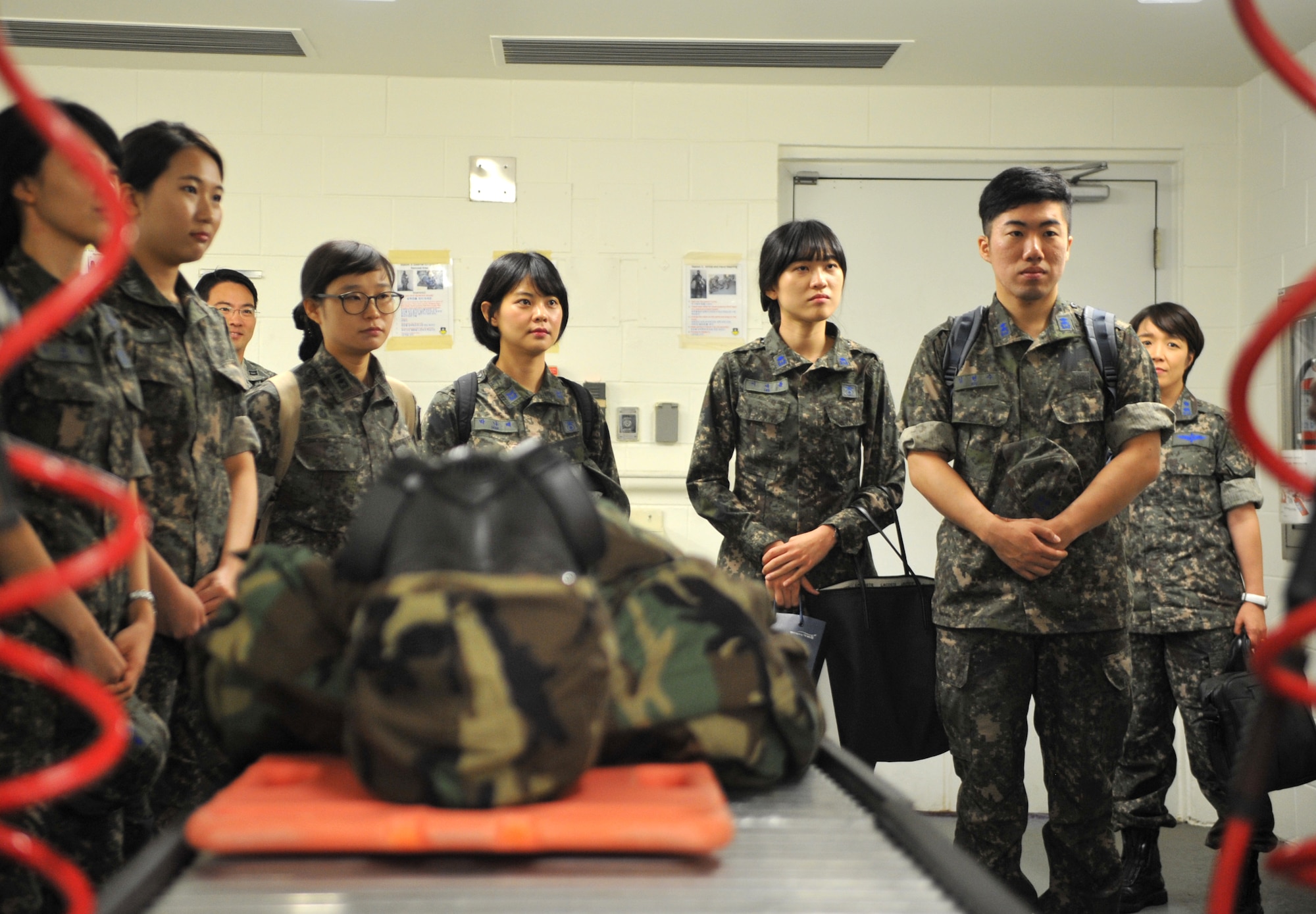 Students from the Republic of Korea Aeromedical Center Primary Flight Nurse Course listen to a briefing about the 51st Medical Group’s decontamination procedures during a tour of the facility at Osan Air Base, ROK, July 11, 2014. Nine flight nurses from different branches of the ROK military participated in the tour, along with the center’s chief nurse, ROK air force Lt. Col. Ji Ah Jeong. (U.S. Air Force photo/Airman 1st Class Ashley J. Thum)