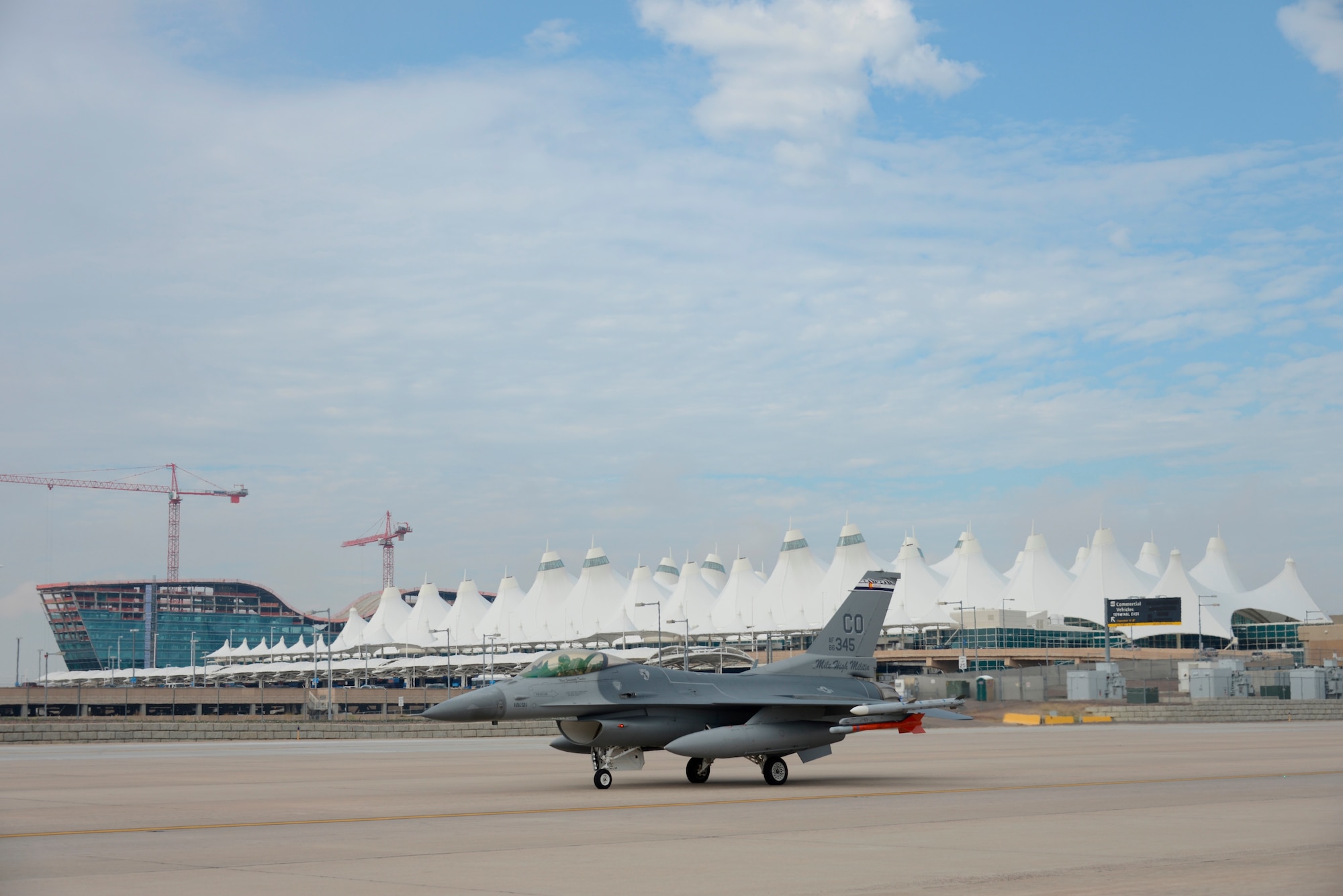 F-16s from the 140th Wing, Colorado Air National Guard begin to return to Buckley Air Force Base July 12, 2014, slightly ahead of schedule, after spending approximately three months at Denver International Airport while the base runway was being reconstructed. Despite relocating their entire flying operations, the wing managed to provide uninterrupted support to their Aerospace Control Alert mission 24/7 throughout the transition to DIA and back to Buckley AFB. (Air National Guard Photo by Tech. Sgt. Wolfram Stumpf) 