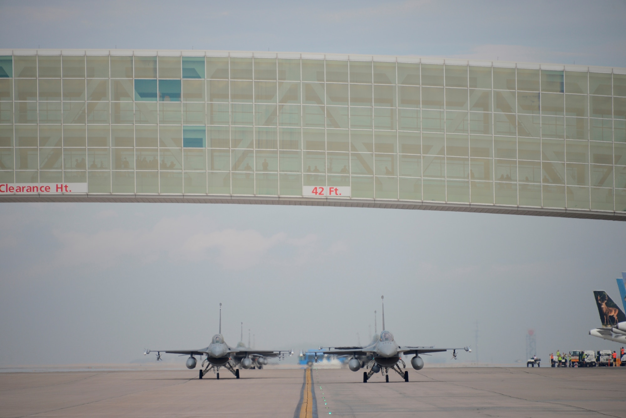 F-16s from the 140th Wing, Colorado Air National Guard begin to return to Buckley Air Force Base July 12, 2014, slightly ahead of schedule, after spending approximately three months at Denver International Airport while the base runway was being reconstructed. Despite relocating their entire flying operations, the wing managed to provide uninterrupted support to their Aerospace Control Alert mission 24/7 throughout the transition to DIA and back to Buckley AFB. (Air National Guard Photo by Tech. Sgt. Wolfram Stumpf) 