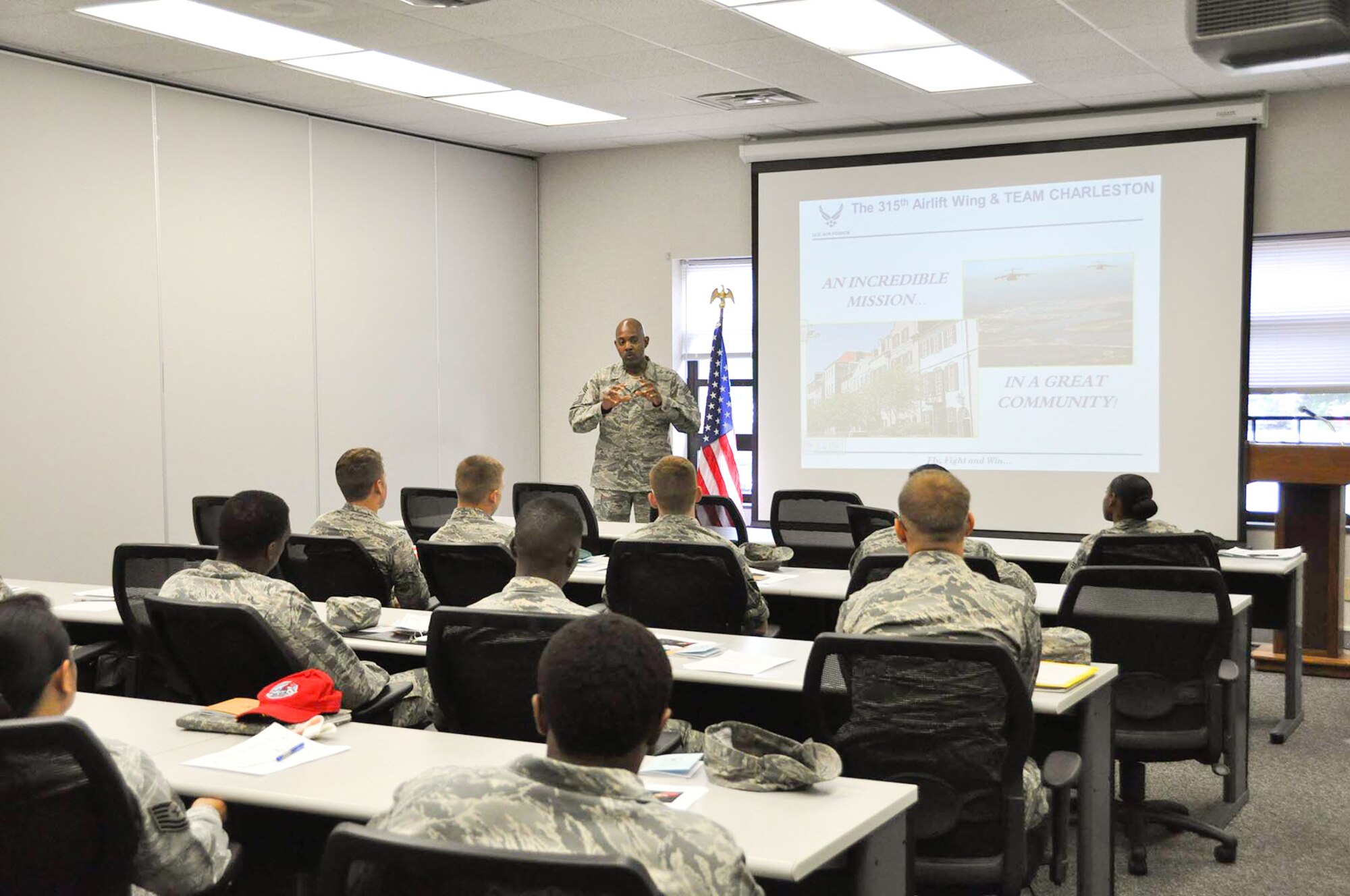 Command Chief Master Sgt. Cameron B. Kirksey, Command Chief of the Air Force Reserve Command, welcomes airmen during a newcomers briefing yesterday in the 315th Force Support Squadron building here at Joint Base Charleston, S.C.  Kirksey visited members of the 315th Airlift Wing during the Unit Training Assembly weekend to address several topics ranging from education and training to readiness. (U.S. Air Force photos/Senior Airman Bobby Pilch)