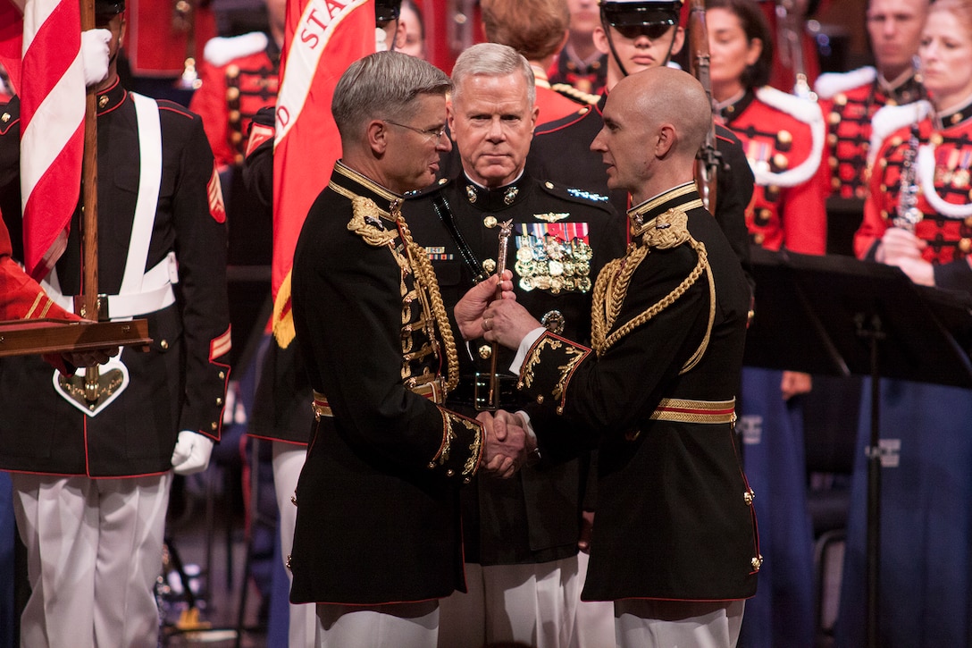 On July 12, 2014, Colonel Michael J. Colburn passed the John Philip Sousa Baton and command of “The President’s Own” United States Marine Band to Assistant Director Lt. Col. Jason K. Fettig. Following the ceremony Col. Colburn retired after serving 27 years in the Marine Corps. (U.S. Marine Corps photo Staff Sgt. Brian Rust/released)