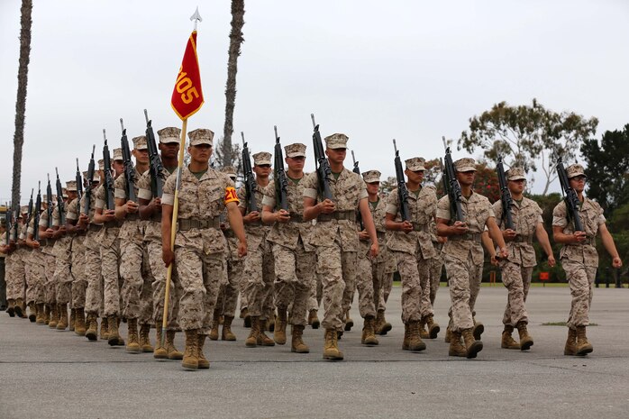 Recruits of Platoon 2105, Echo Company, 2nd Recruit Training Battalion, march across the parade deck during Final Drill aboard Marine Corps Recruit Depot San Diego, June 30. Each platoon competes in Initial and Final Drill while in recruit training.